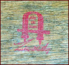 Gustav Stickley's firm's red decal signature used from 1905 to 1912.